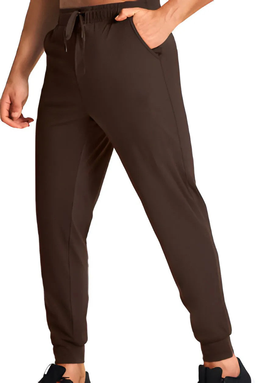 Man wearing solid colour loose-fit casual polyester trousers for leisure activities.