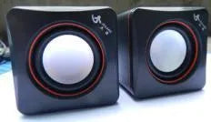 Small black square USB-powered 2.0 computer speaker for desktop placement
