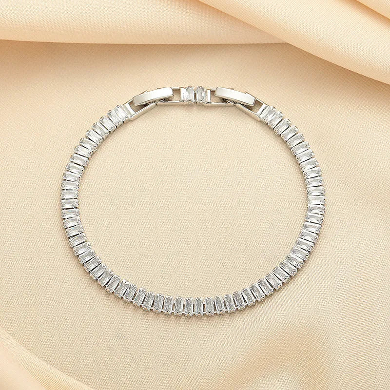 Rectangular brass bracelet with full diamond pattern from inlaid zircon treatment in champagne gold colour