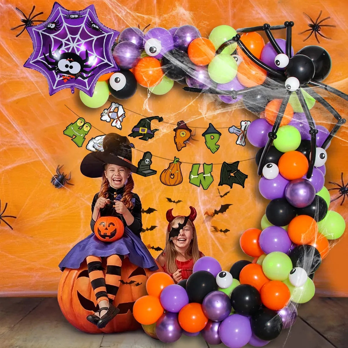Halloween spider balloon arch kit with black and white balloons showing skull and pumpkin designs