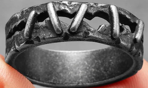 Men's dark stainless steel punk ring with double band and stitching-style texture.