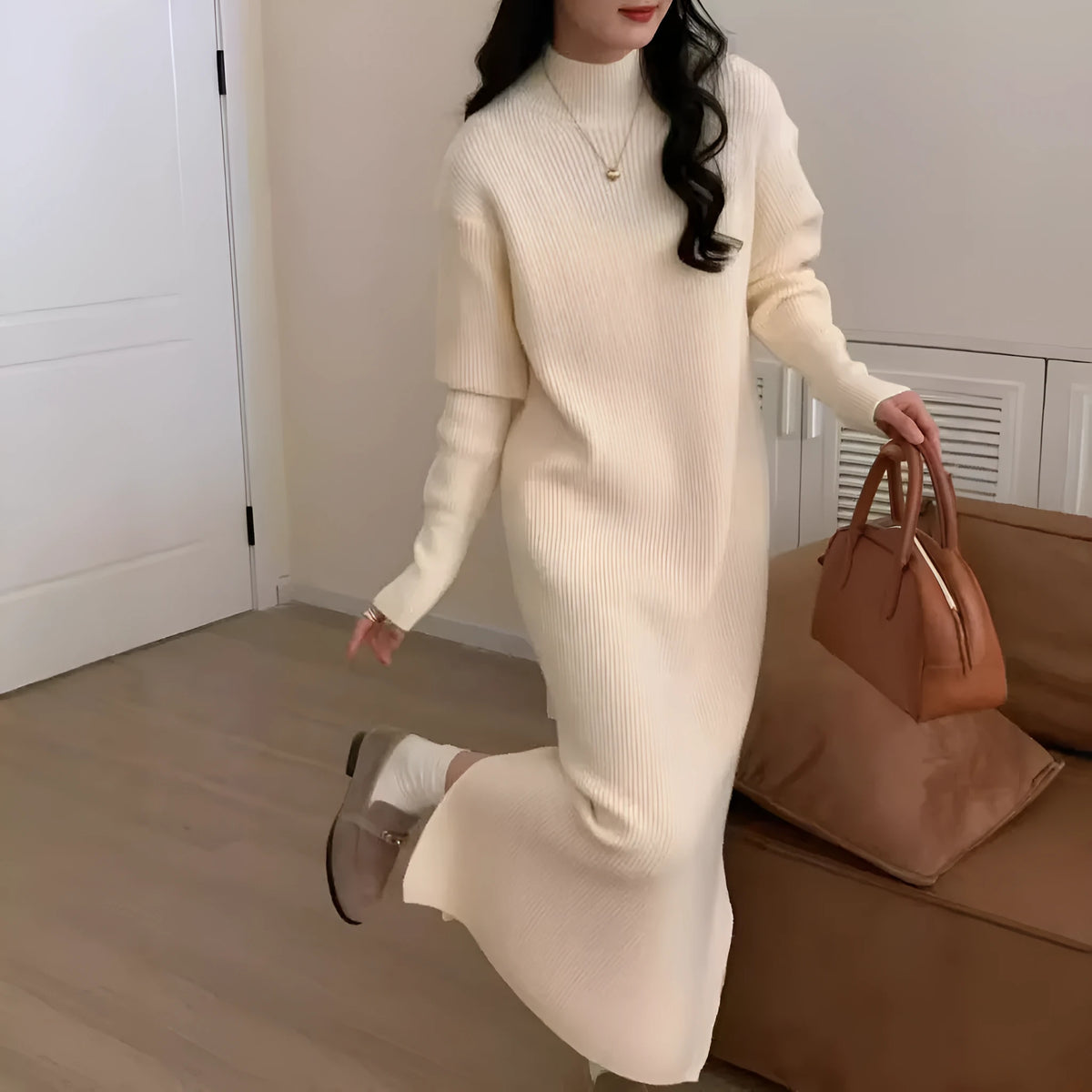Acrylic half turtleneck knitted dress in graphite colour with high waist and overknee long length