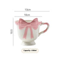 Ceramic heart bow design mug in white powder or black pink colour with 301-400ml capacity
