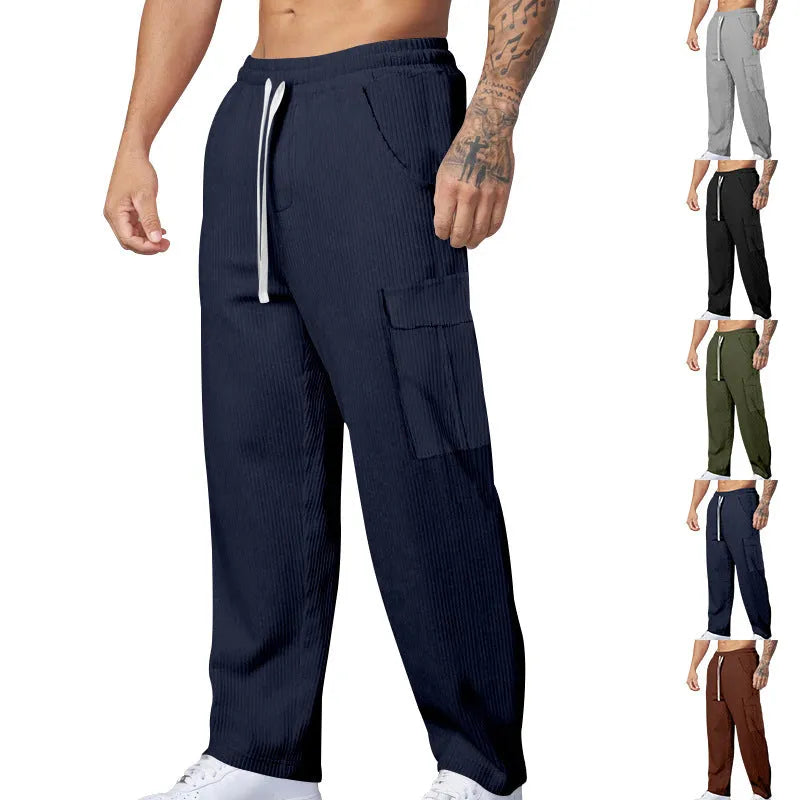 Men's corduroy cargo trousers in loose-fitting wide-leg design with drawstring waist