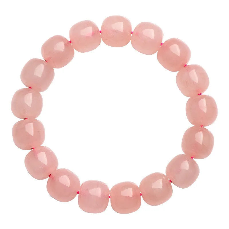 Pink crystal barrel bead bracelet with geometric 8x10mm beads on wrist