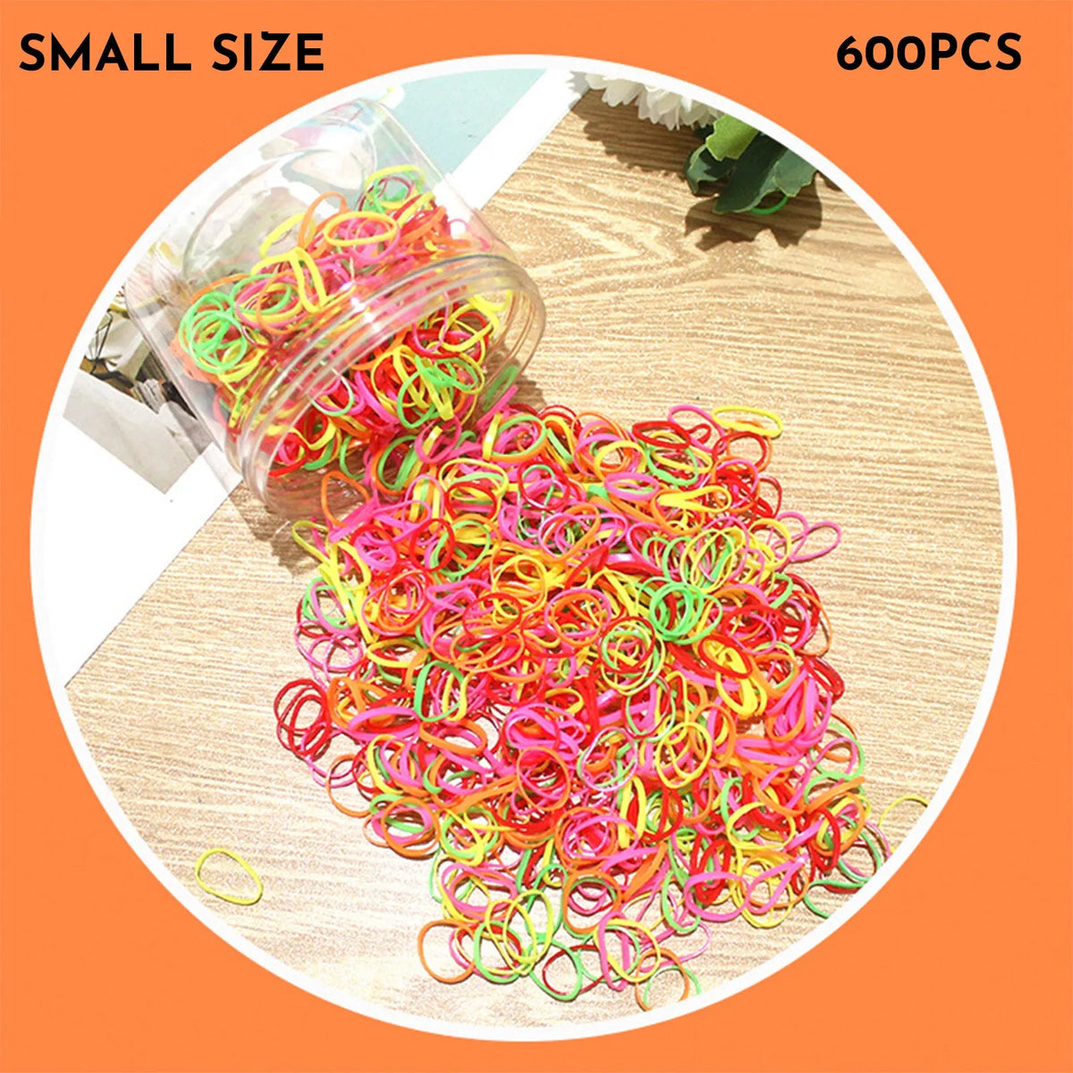 Pack of small, colourful TPU elastic hair bands for babies and toddlers in a reusable container.