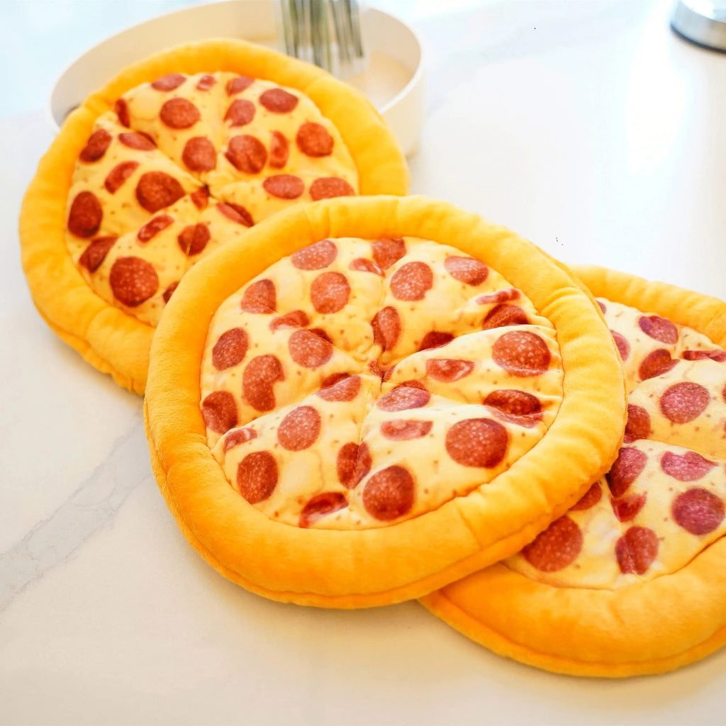 Yellow pizza design dog chewing toy with teddy bear motif measuring 20cm across