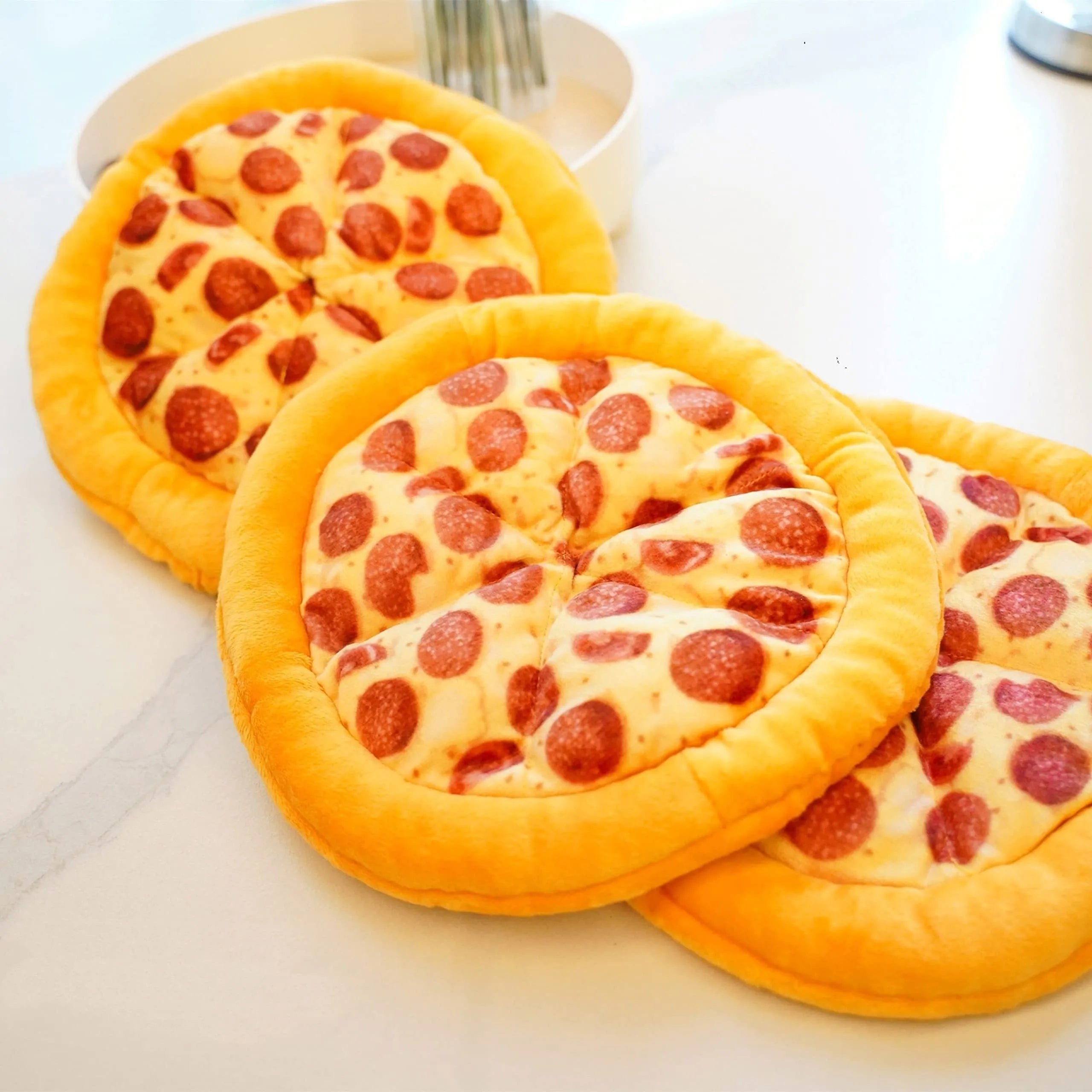 Yellow pizza design dog chewing toy with teddy bear motif measuring 20cm across