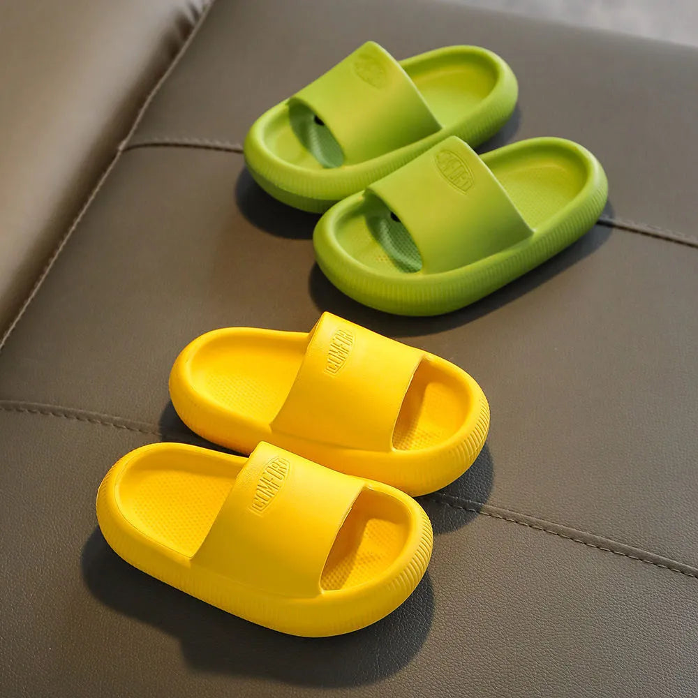 Children's mixed colour EVA slippers with non-slip soles showing 1.5cm thickness