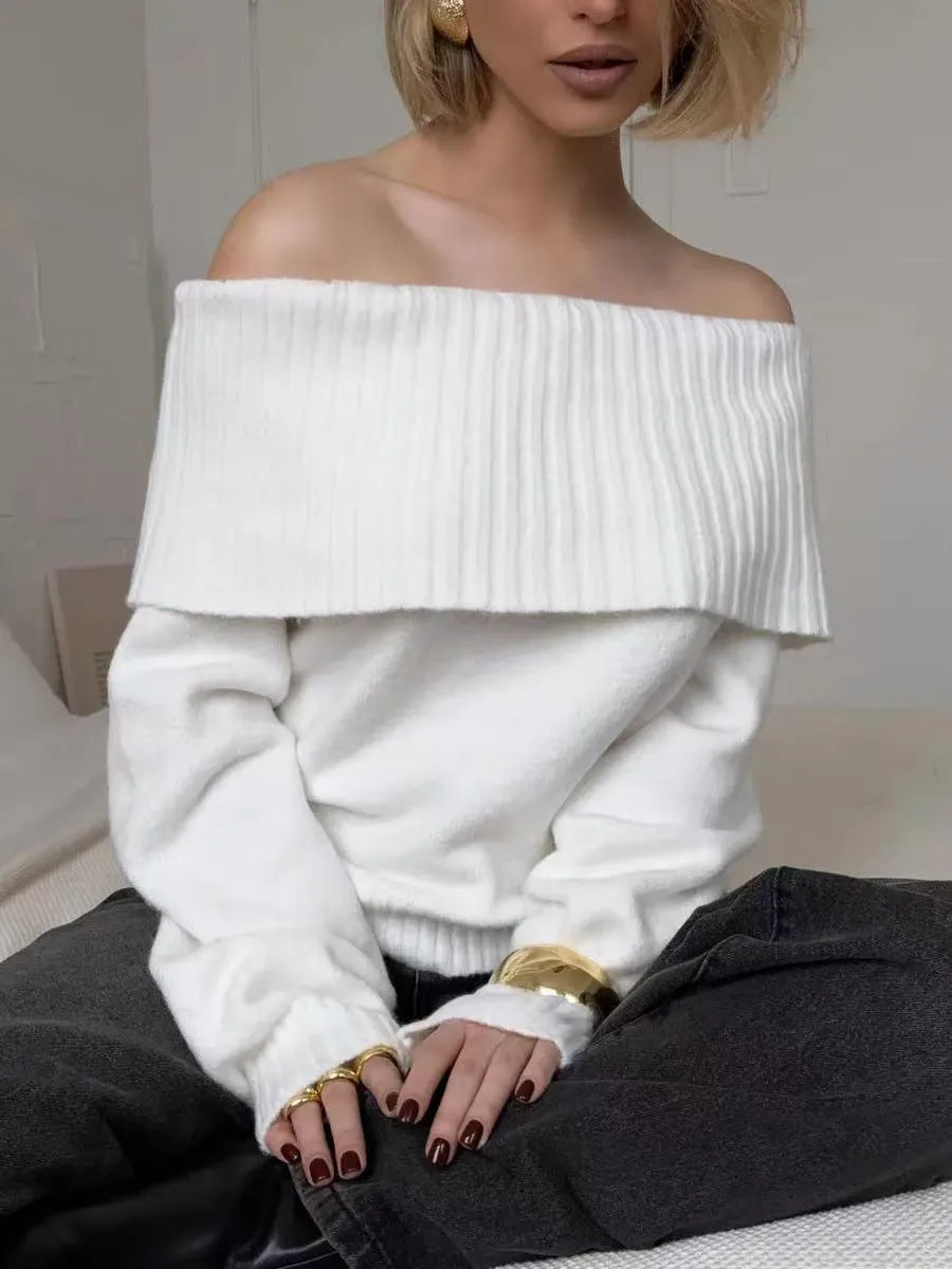 Grey off-the-shoulder strapless pullover sweater with a 3D pattern texture.