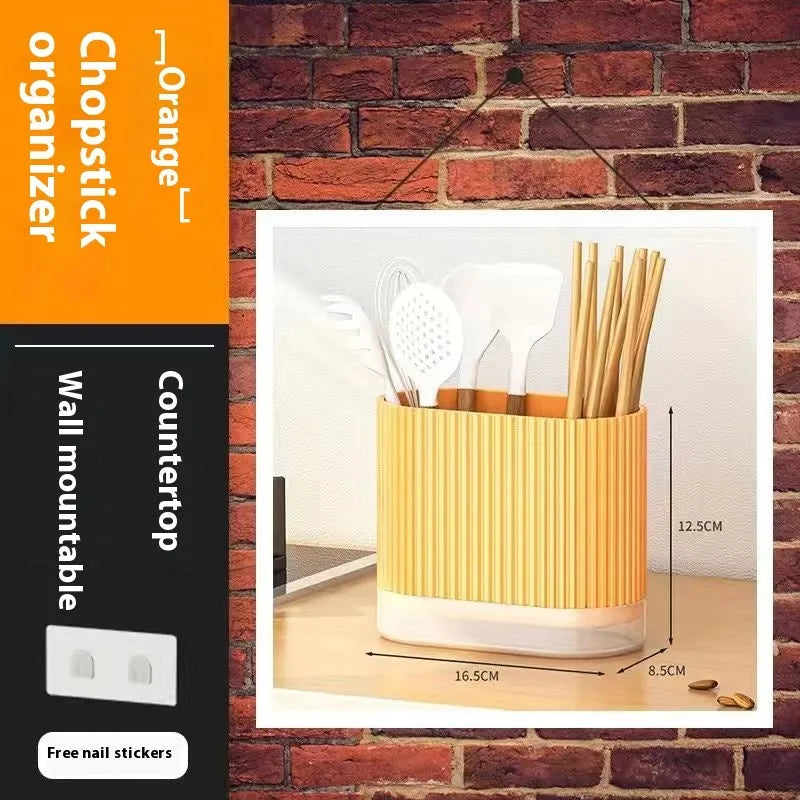 A beige plastic wall-mounted chopsticks holder with a cross-border drain design for kitchen utensil storage.