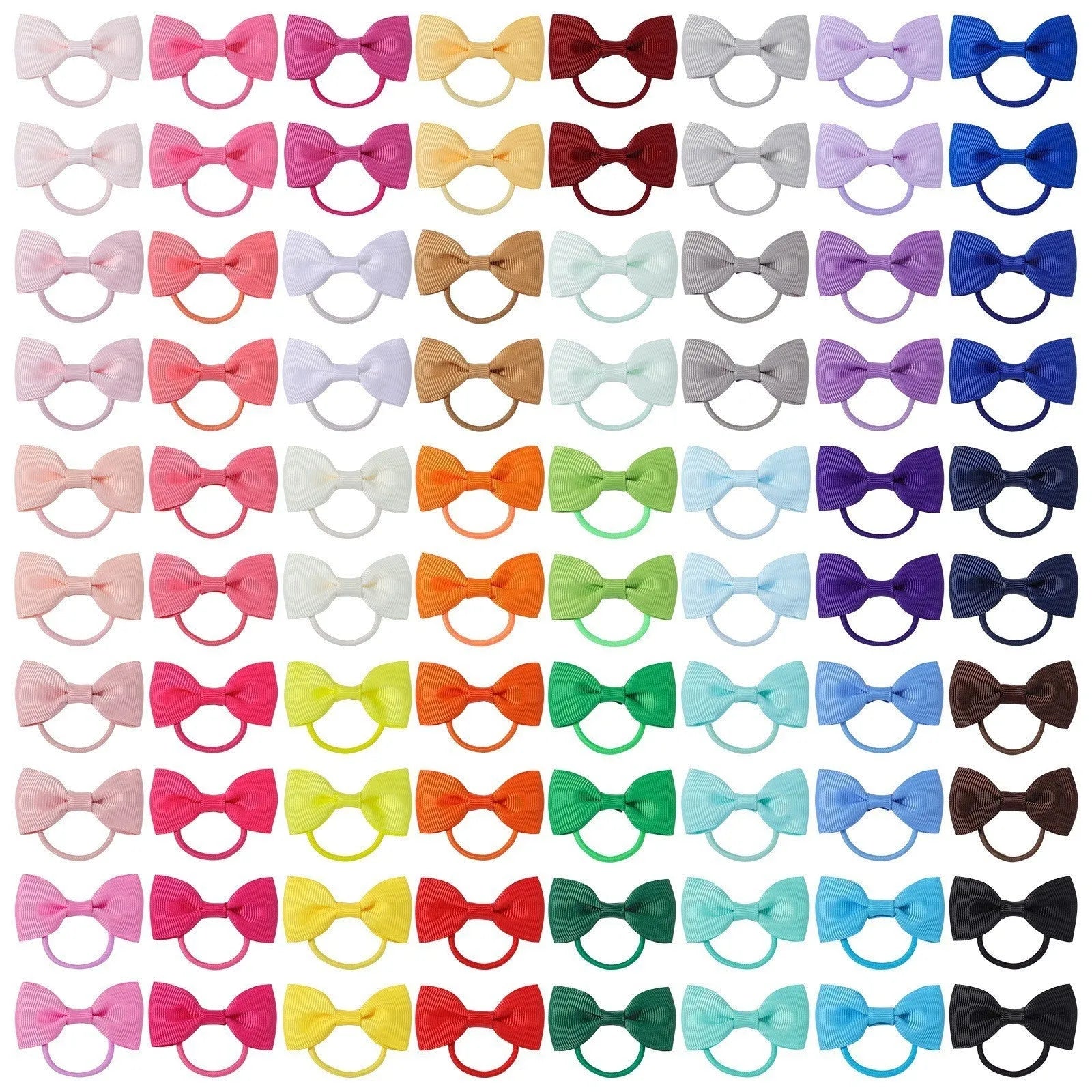 Multi-coloured baby hair ties with small grosgrain ribbon bows, soft elastic bands for infants and toddlers.