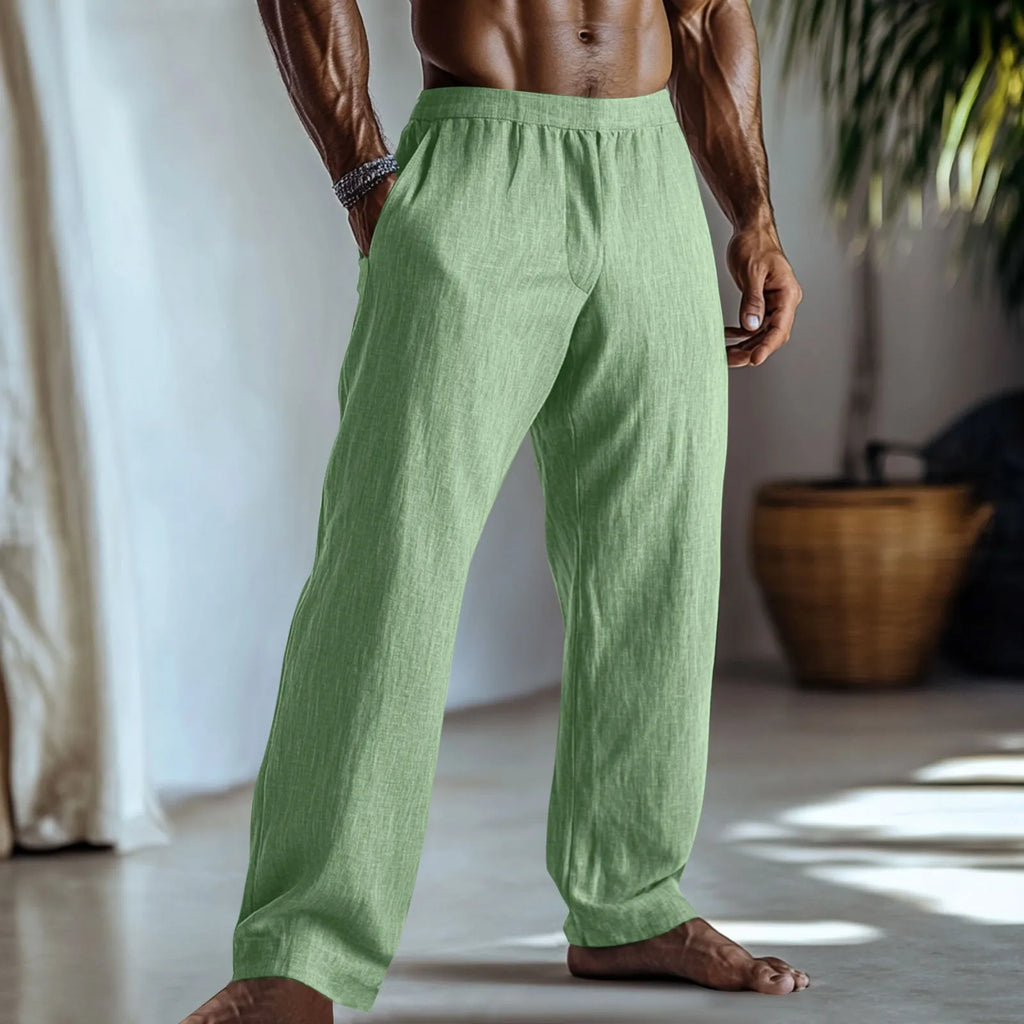 Straight-leg cotton linen casual trousers in light green colour, showing five-pocket design.
