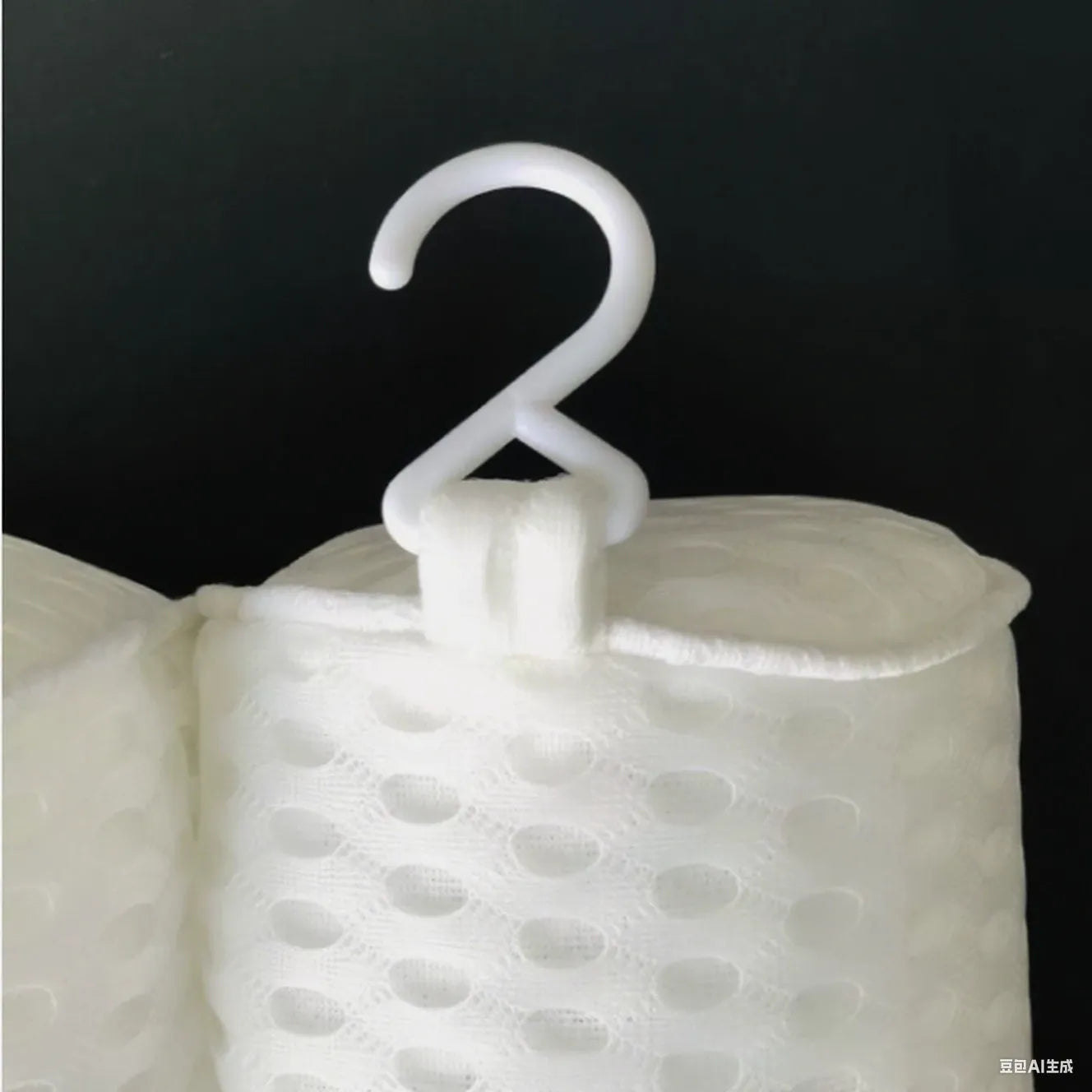White 3D mesh bathtub pillow with seven suction cups for non-slip placement