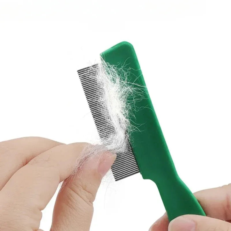 Green plastic handle flea comb with stainless steel pins for dogs and cats.