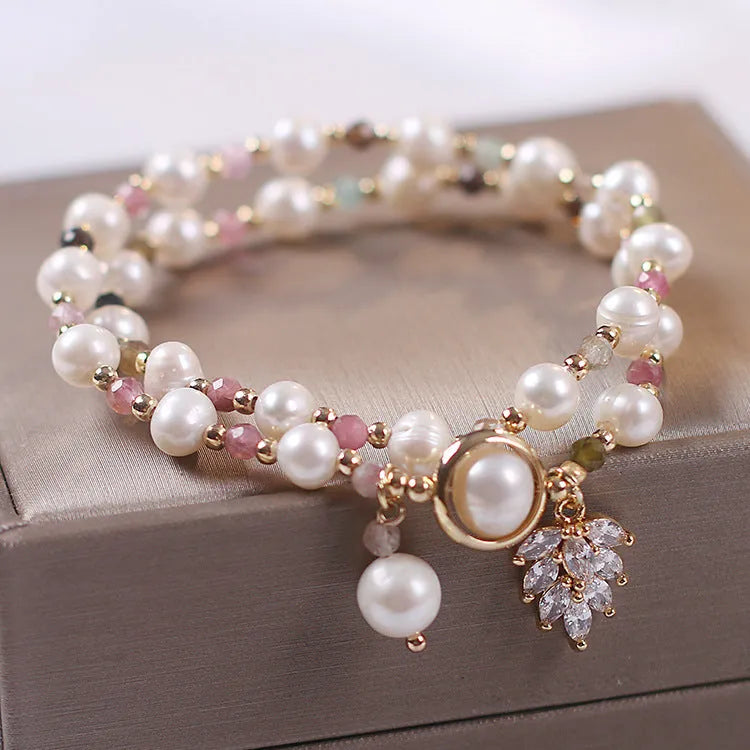 Double layer crystal bracelet with lucky cat charms and red cat's eye flower beads