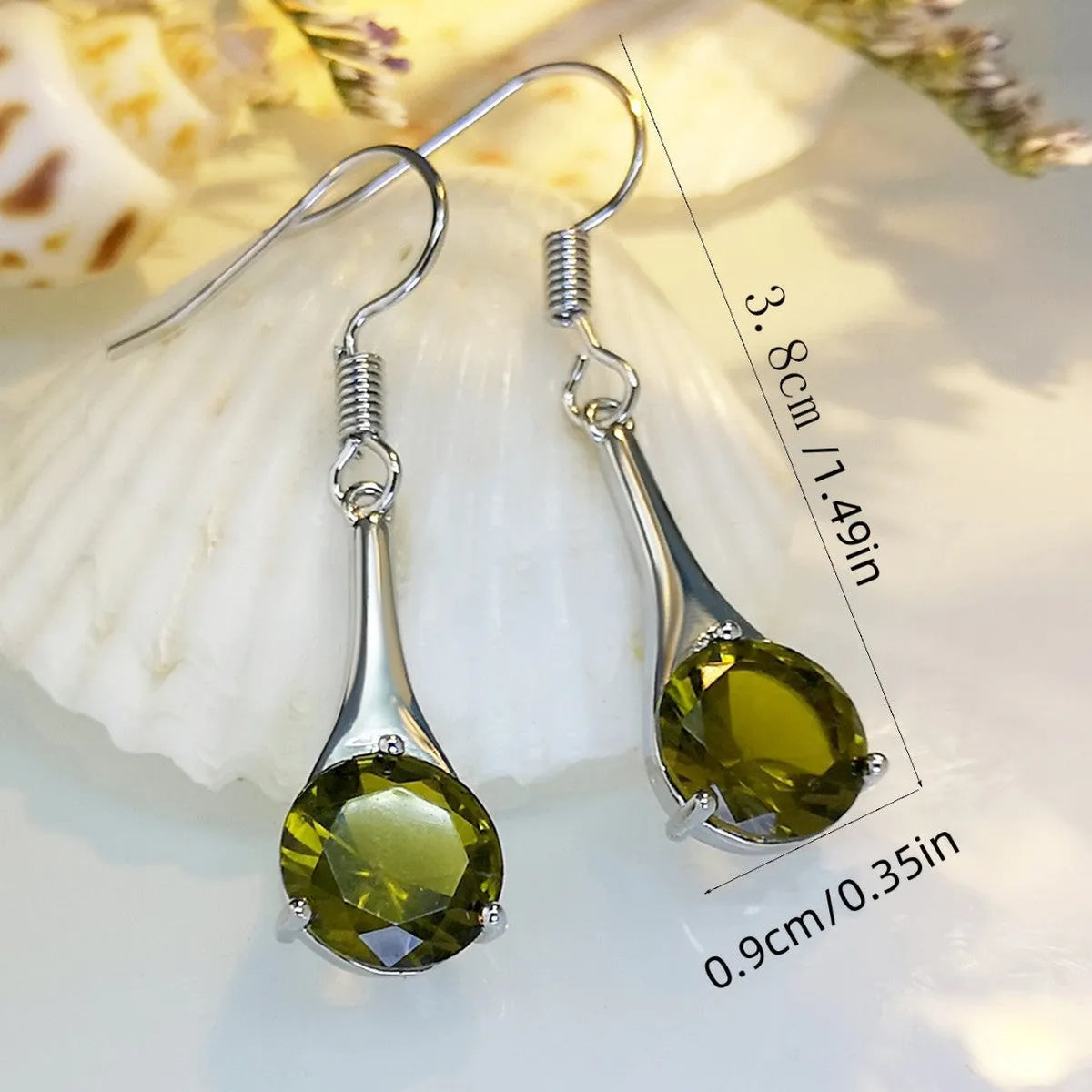 Olive green topaz water drop shaped earrings with retro design and minimalist styling