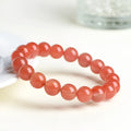 Natural South Red Cherry Agate scattered bead bracelet showing cherry red colour and polished surface