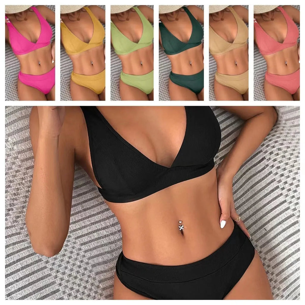 Women's black lace-up front split bikini swimsuit on a mannequin.