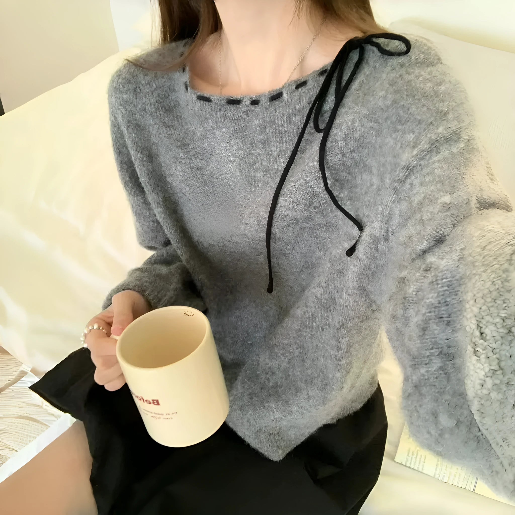 Women's loose-fitting knitwear pullover jumper in black or grey