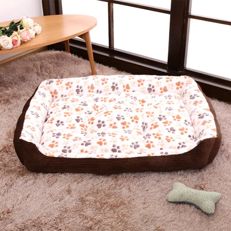 Beige soft plush dog bed with raised edges shown in a home setting.