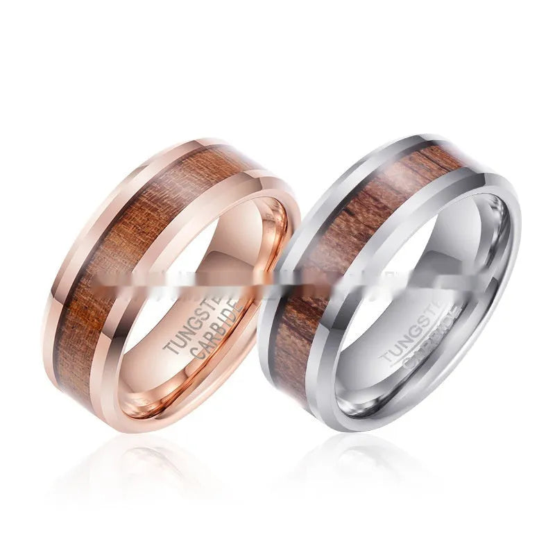 8mm wide U-shaped Ugyen men's ring in rose gold or steel colour on a plain background.
