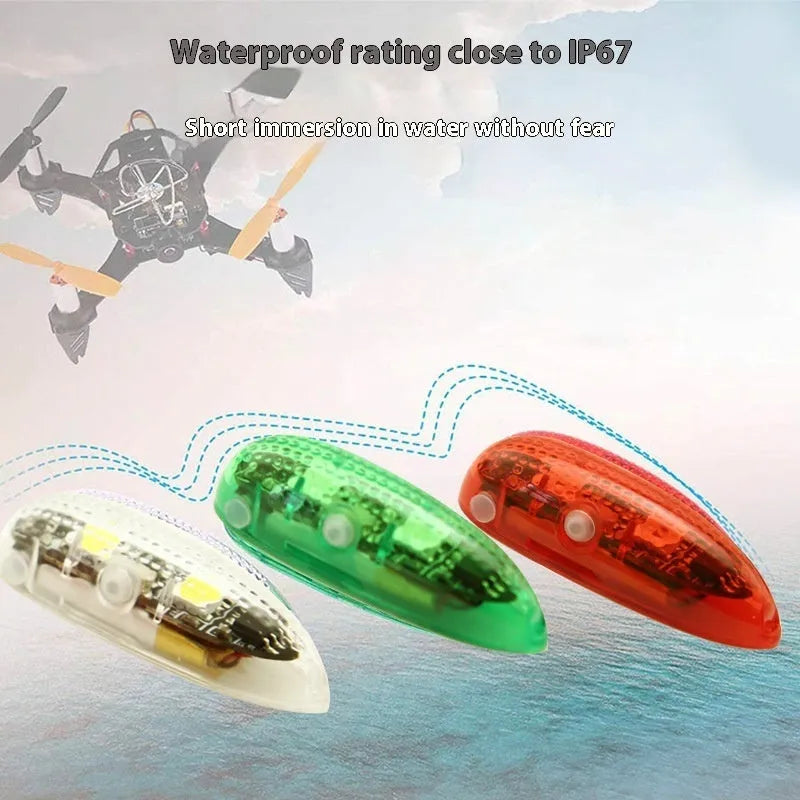 Three small V3 wireless charging waterproof LED navigation lights with adhesive backing for model boats and cars.