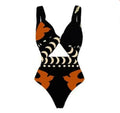 Women's polyester one-piece swimsuit showing multiple colour options including black, yellow, and printed designs