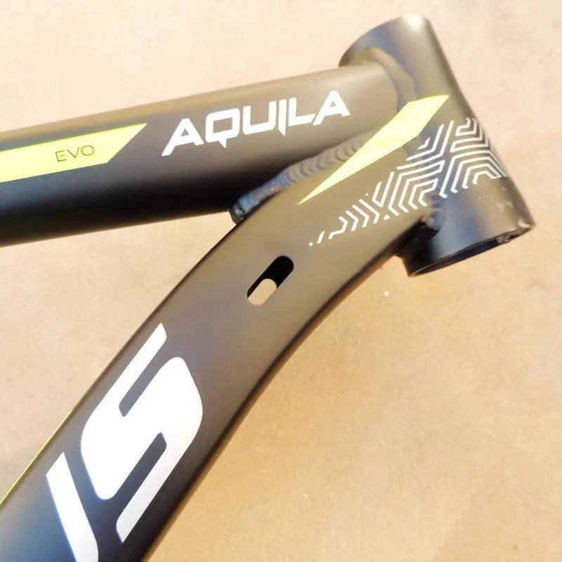Black green aluminium 29-inch mountain bike frame with disc brake mounts and internal cable routing ports.