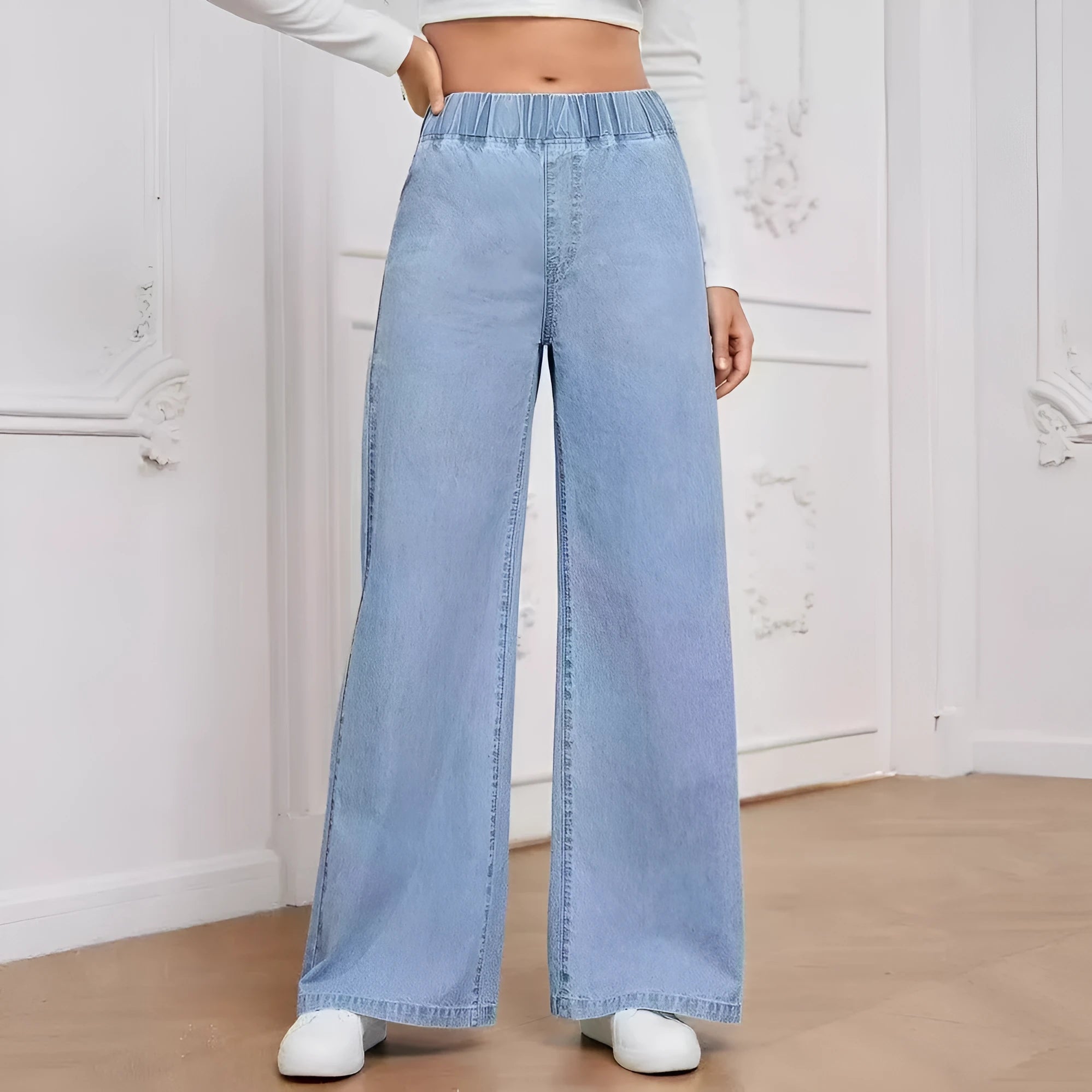 Light blue washed wide-leg denim trousers with straight leg cut and mid waist design