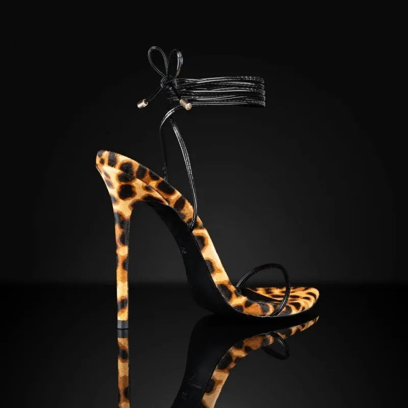 Women's pointed toe leopard print Roman gladiator sandals with lace-up buckle fastening