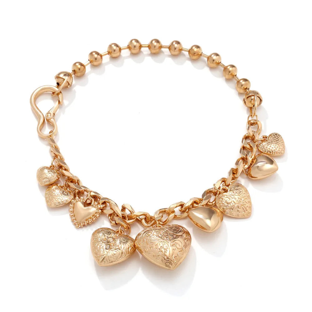 Carved heart pendant necklace in gold colour with adjustable chain length