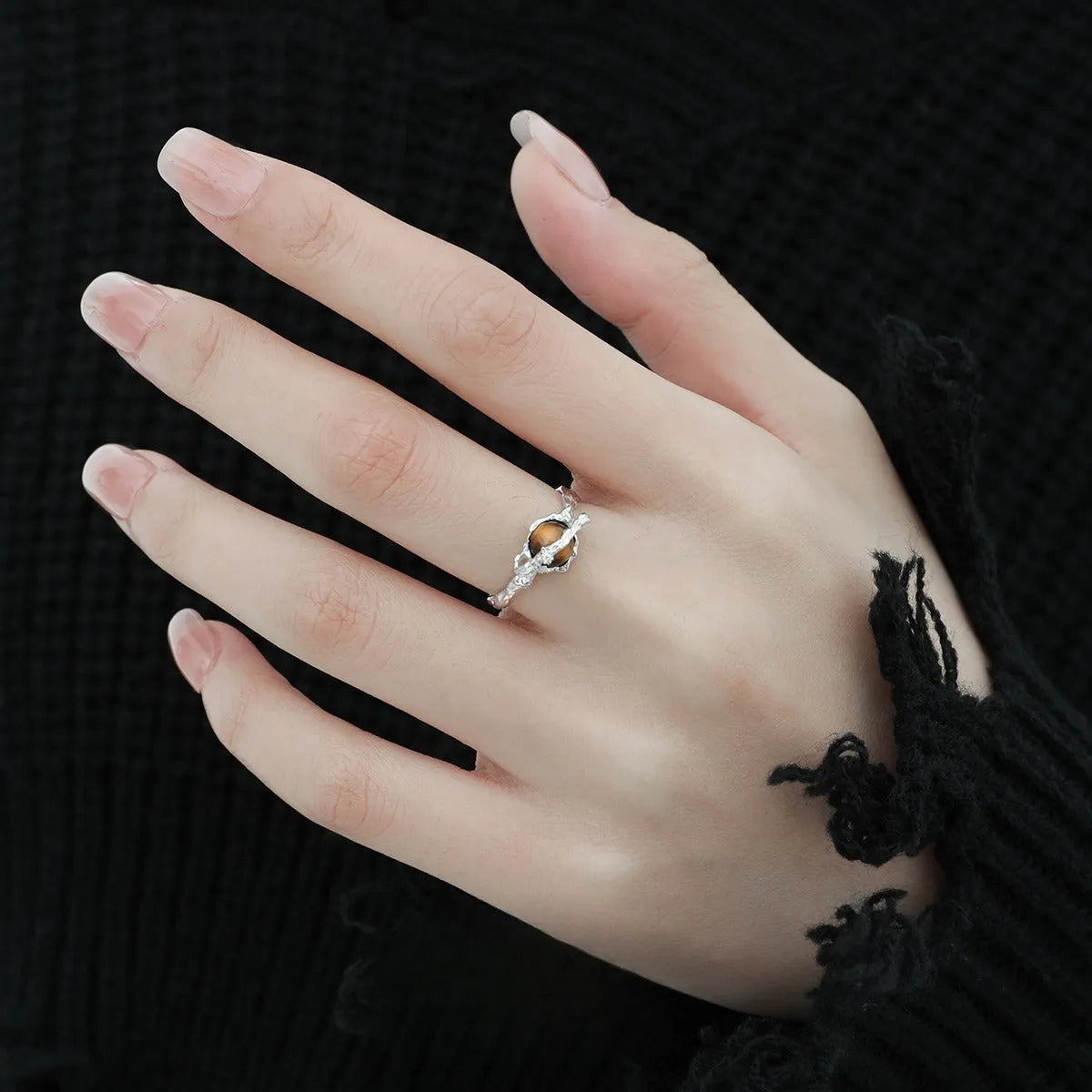 Women's Saturn open ring with adjustable size and electroplated white gold finish