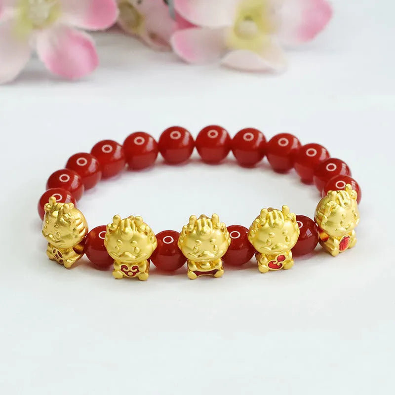 Red agate bracelet with Chinese dragon motif on 8mm beads.