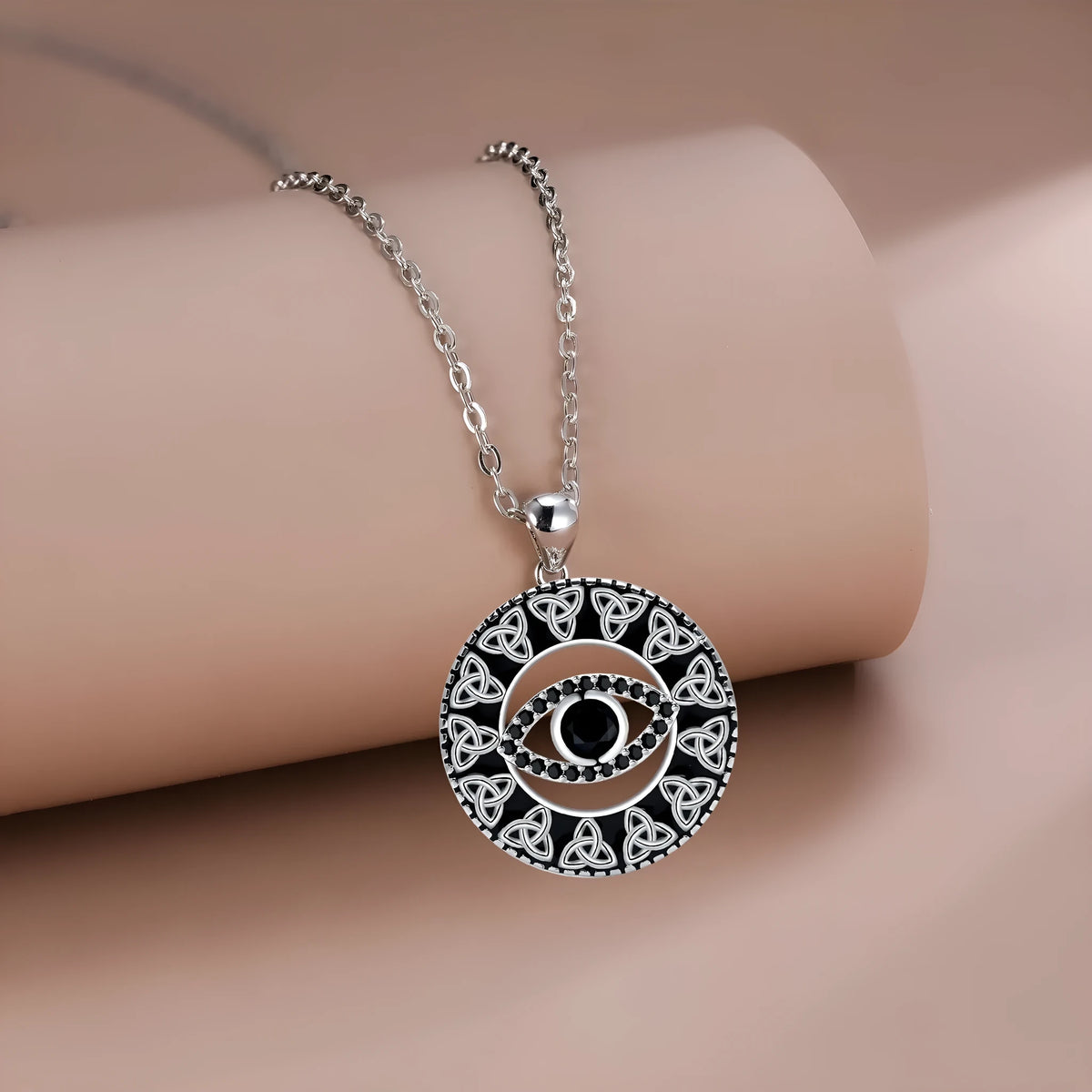 Copper devil's eye pendant necklace for women with a cross chain style and electroplated finish.