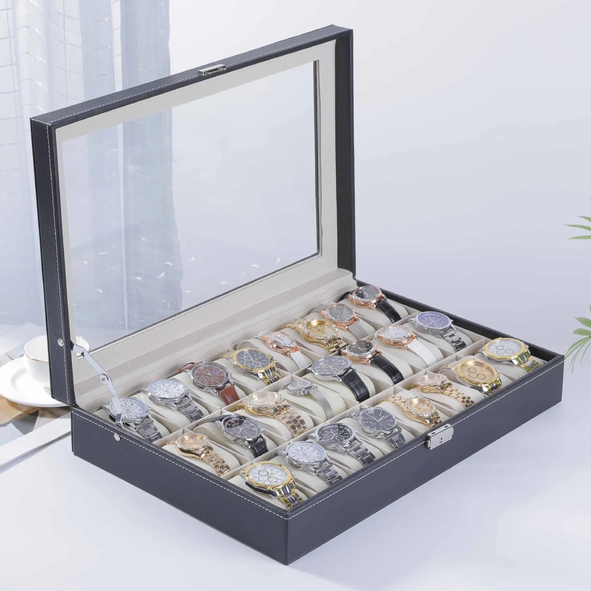 Grey high-grade leather watch storage box with transparent lid showing watch slots inside.