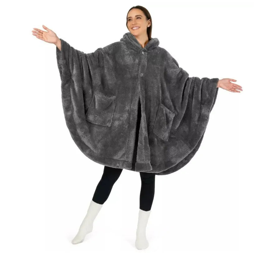 A thick pink hooded cloak bathrobe with long sleeves, shown on a hanger.