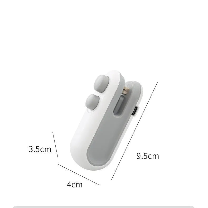 White handheld USB rechargeable heat sealing machine for chip bags with magnetic back and cutter