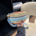 Blue and pink woven straw beach bag with shell shape and single shoulder strap