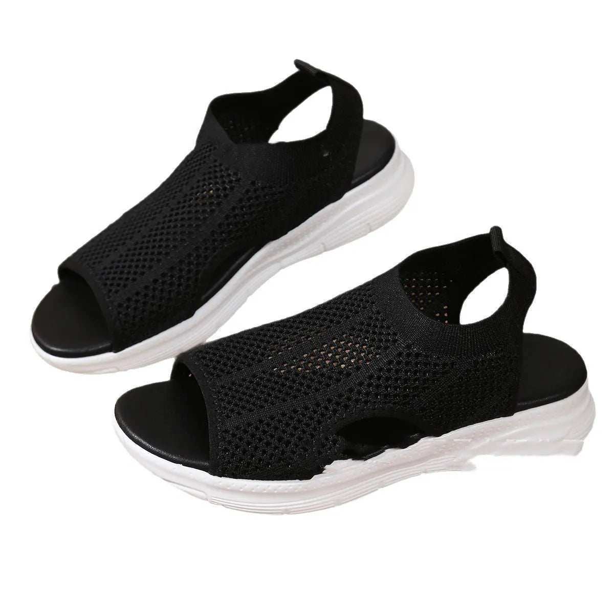 Women's platform sports sandals in black, milky white, and pink on a flat head design with a rubber sole.
