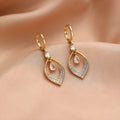 Women's zircon drop tassel earrings with teardrop shape and electroplated gold or silver finish
