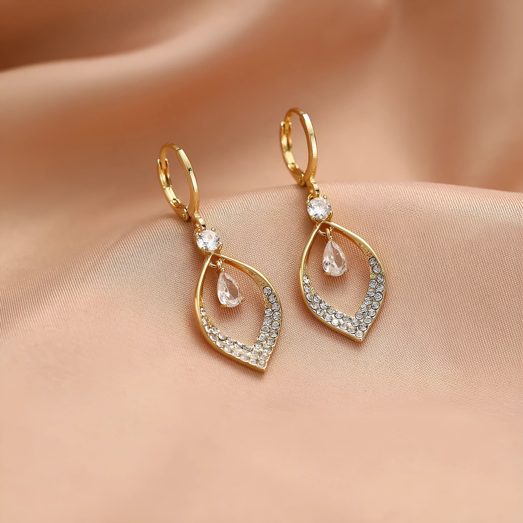 Women's zircon drop tassel earrings with teardrop shape and electroplated gold or silver finish