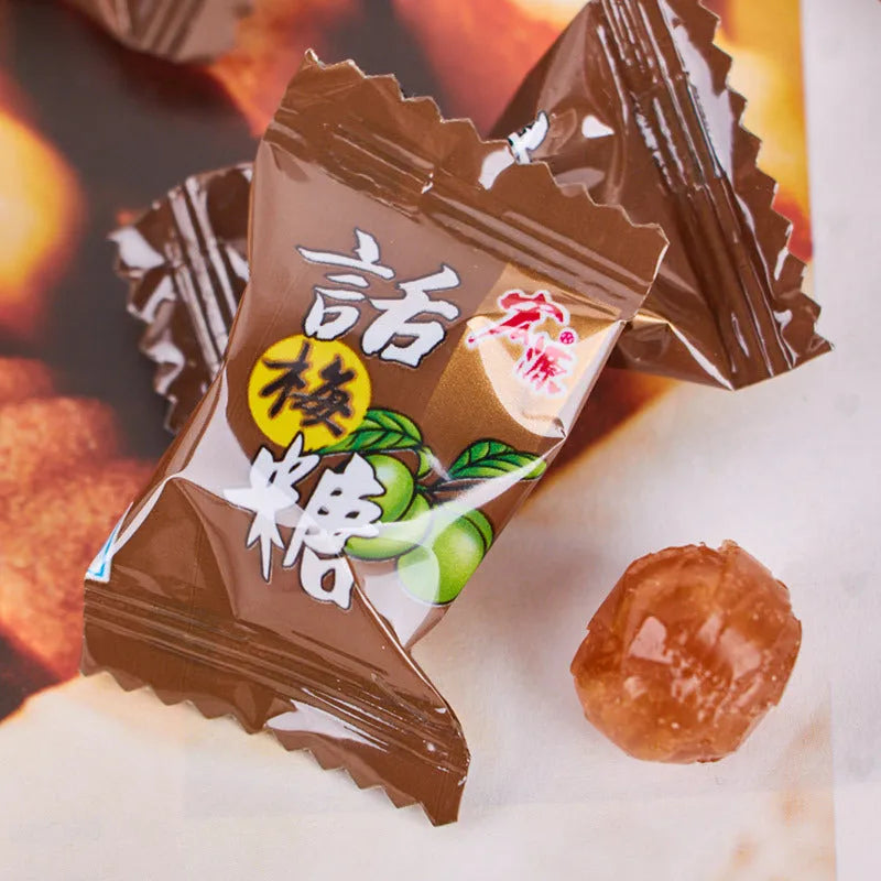 Three bags of hard candy in guava, plum, and tangerine peel flavours with net weights displayed