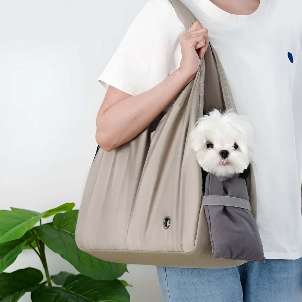 Apricot coloured cloth pet carrier handbag for small dogs and cats, shown with dimensions 41cm by 16cm by 28cm.