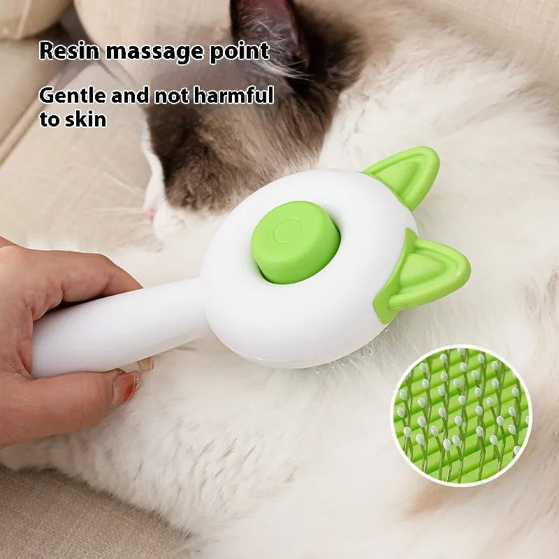 Self-cleaning cat grooming comb with stainless steel pins and rubber massage nodules in greenish white colour