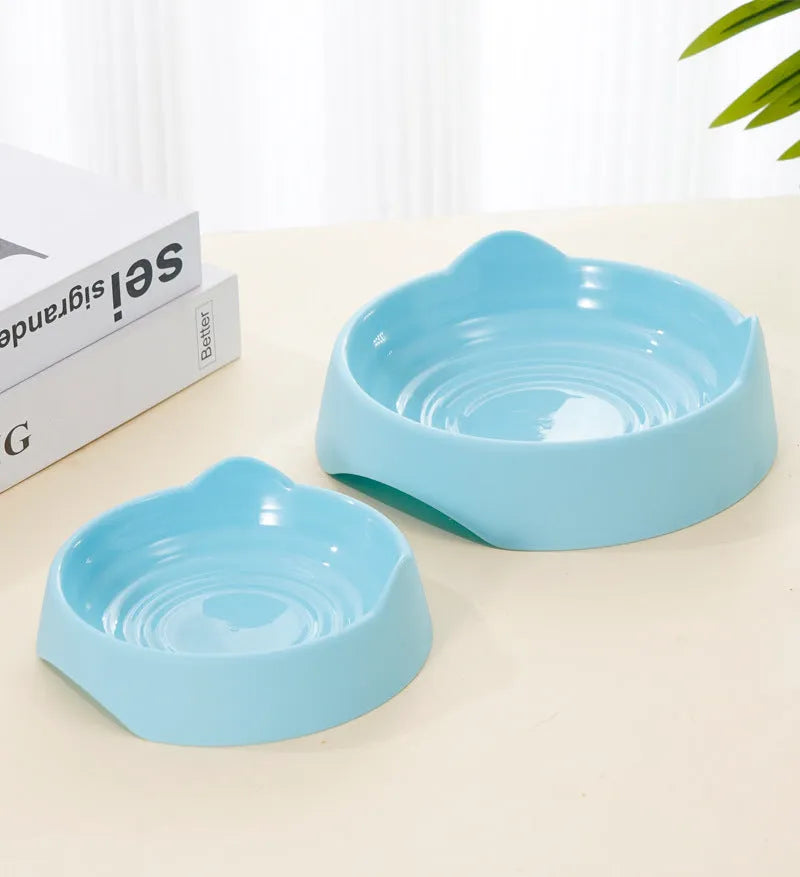 Ceramic dog slow feeder bowl with maze design in blue, green, or pink colours for fast-eating puppies