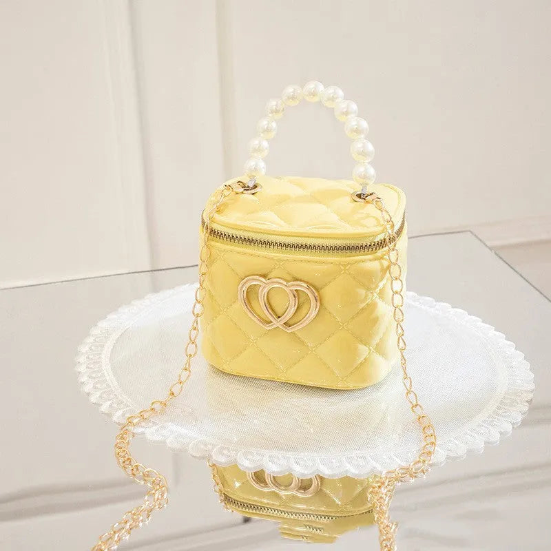 PVC bucket gel handbag with heart pattern in multiple colour options including apricot, black, green, orange, red, white and yellow