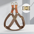 Brown vest style anti loss dog leash made of cotton and nylon with metal clasp.