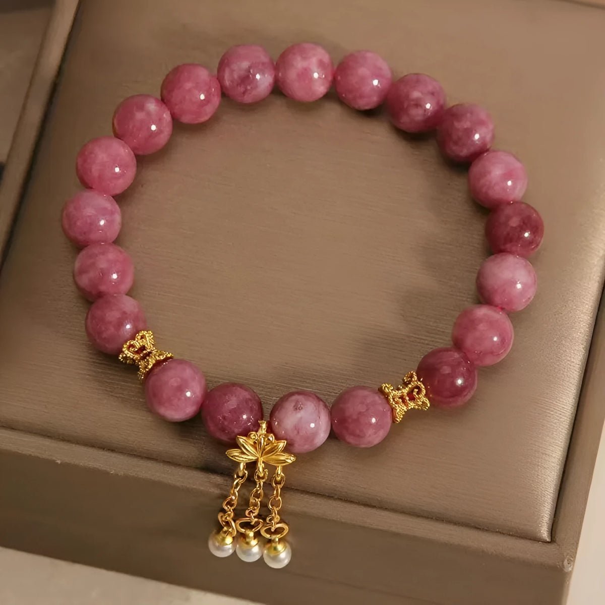 Natural stone bracelet with pink lotus tassel and pearl pendant bead in New Chinese style
