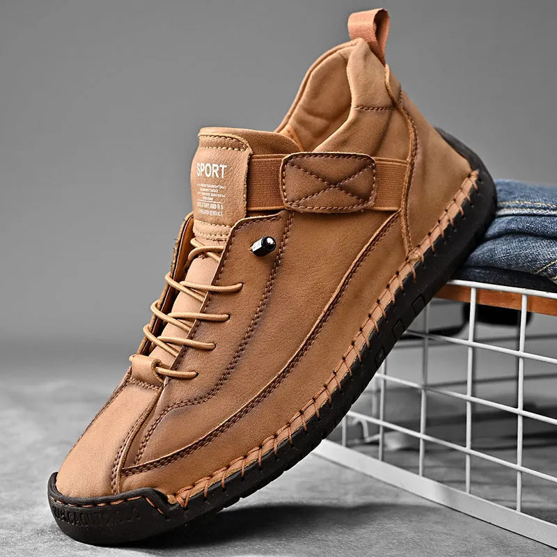 Men's mid-top Martin boot in khaki with sewn sole detail and elastic band.